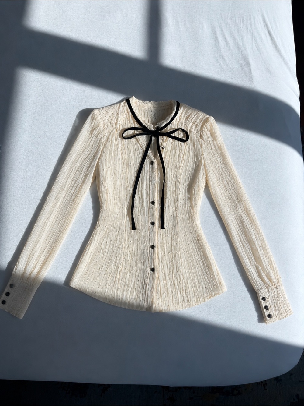 Free People Cream Textured Button-Down Blouse with Black Bow